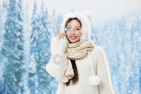 手拿雪花素材手拿雪花片的可爱冬季女孩背景