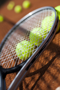 钜惠大满贯网球的网球打网球躺背景