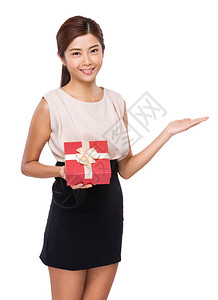 有圣诞礼物的亚洲女人图片