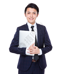 年轻亚洲商人手持笔记本电脑在图片