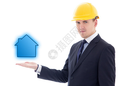 英俊的商人或戴着黄色建筑头盔的建筑师图片