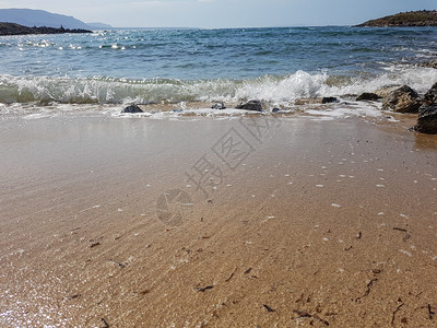 美丽的海洋海浪和沙油海水图片