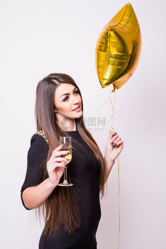 女人有明星形状的气球喝着香槟图片