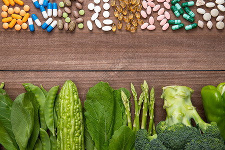绿色安全食品多色药品和绿色蔬菜背景