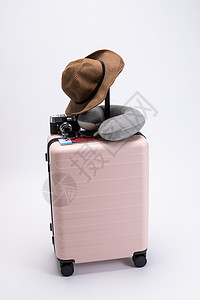 我粉色帽子行李箱背景