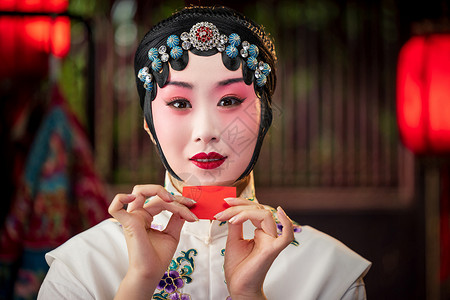 嘴唇和口红镜子京剧女演员对着镜子化妆背景