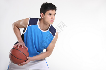 东方青年男子打篮球背景