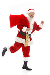 圣诞老人背着布袋奔跑图片