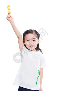 可爱的小女孩高举冰棍图片