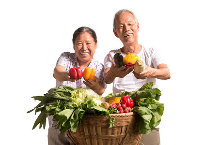 农民夫妇出示自家蔬菜菜农高清图片素材