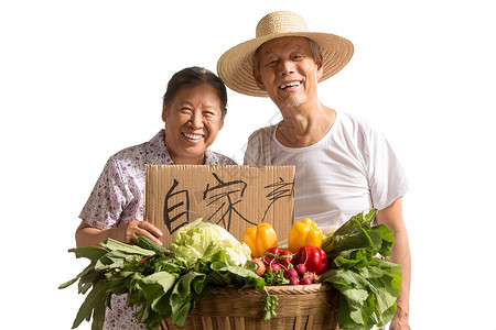 农民夫妇出示自家蔬菜人高清图片素材