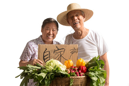 农民夫妇出示自家蔬菜中国高清图片素材
