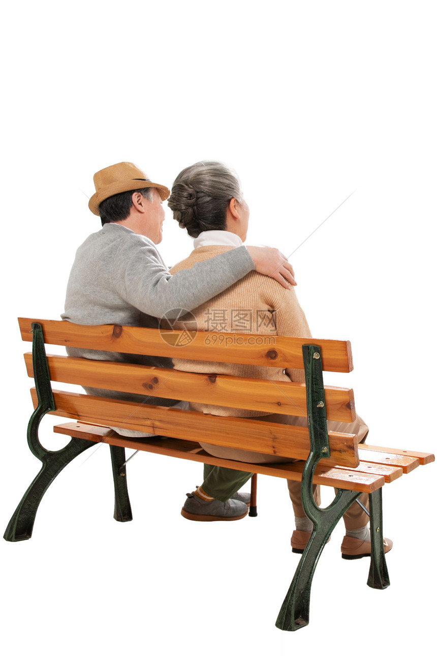 坐在长椅上的老年夫妇图片