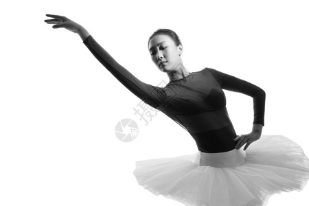 青年女人跳芭蕾舞背景图片