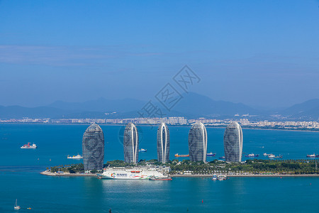 三亚游轮三亚凤凰岛城市建筑背景