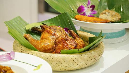 旅行食品素材东南亚特色美食泰式椰香烤鸡背景