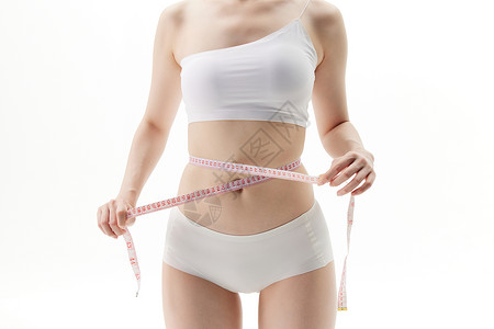女子减肥瘦身量腰围背景图片