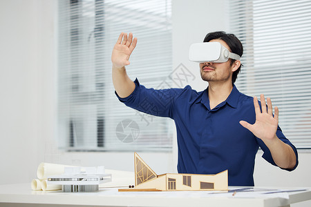 3d空间模型建筑设计师使用vr设备虚拟滑动屏幕背景
