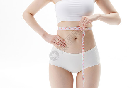 女性减肥瘦身量腰围背景图片