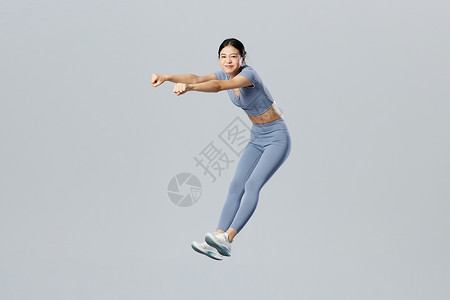 创意悬浮活力健身女性形象图片