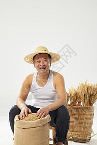 农民稻谷丰收图片