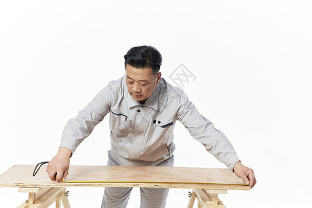 凳子尺寸装修工人测量板材尺寸背景
