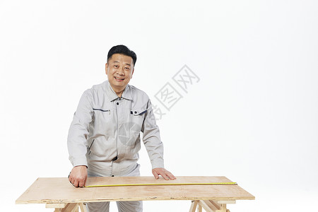 凳子尺寸装修工人测量板材尺寸背景