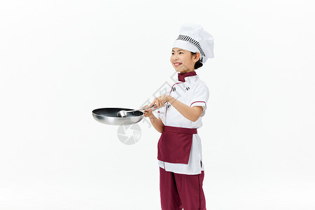 掌勺的小小女厨师做饭背景图片