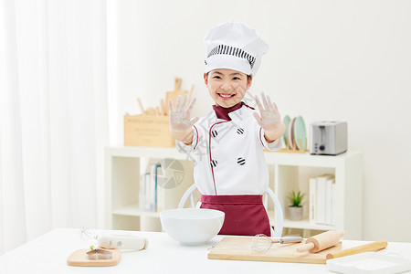 劳动节环卫男孩居家烘焙的小小厨师形象背景