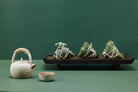 茶饮食端午节传统粽子一壶茶背景