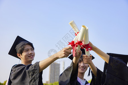 蓝天下的大学生毕业季毕业证书高清图片素材