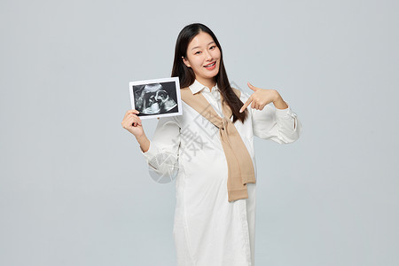 孕妇妈妈手拿b超图图片