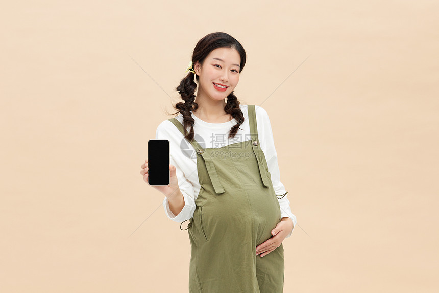 活力孕妇展示手机图片