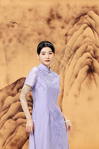 中式古典山水画背景旗袍女性高清图片