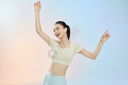梦幻芭蕾舞美女挥手舒展身体的女性形象背景