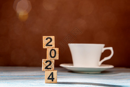 超美新年素材2024美拉德背景色上的一杯咖啡背景