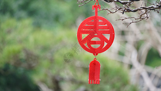 春节折纸字新年春节挂着的春字挂饰背景