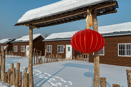 冬季农家乐乡村冰雪红灯笼高清图片