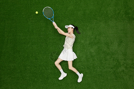 创意俯拍年轻女孩打网球精彩瞬间背景图片