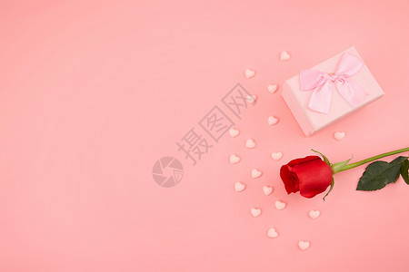 红色花朵背景情人节红色玫瑰与粉色巧克力背景背景