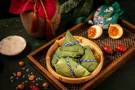 赛龙舟的粽子端午节节日美食粽子背景