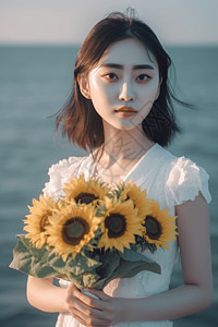 海边美女手拿一束向日葵背景图片