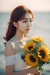 海边美女手拿一束向日葵背景图片