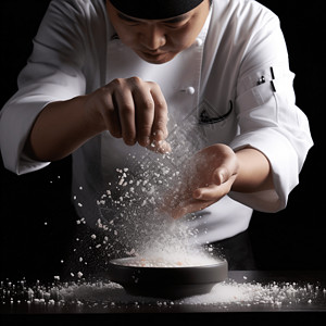 厨师用盐和胡椒粉调味菜图片