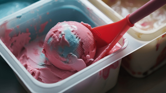 从容器中挖出的一勺冰淇淋高清图片