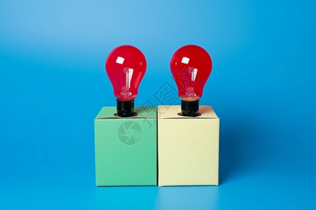 纸盒子上的红色灯泡背景图片