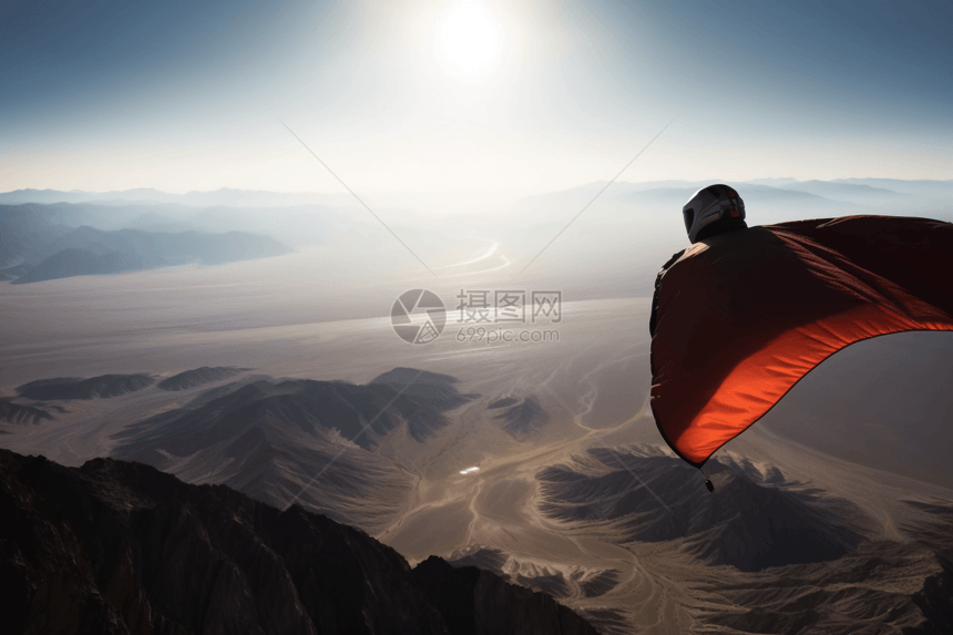 沙漠上飞行的人图片