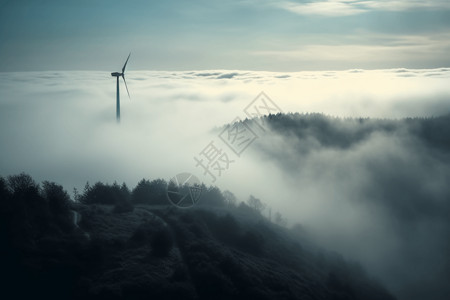 山上晨雾山顶上的风车涡轮机设计图片