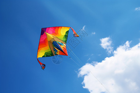 飞行风筝蓝天下的彩色风筝背景