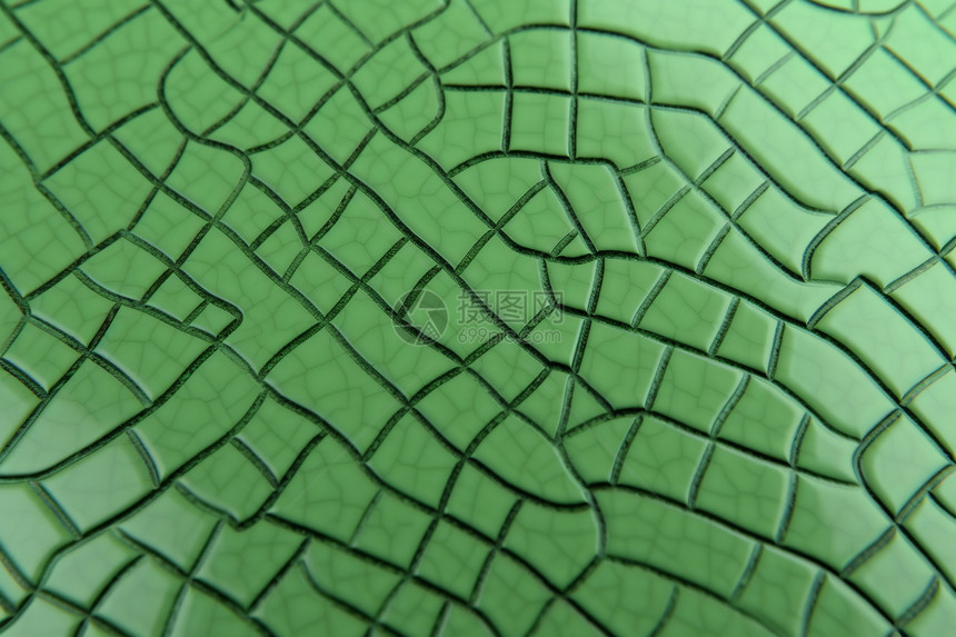 绿色瓷砖的裂缝图片